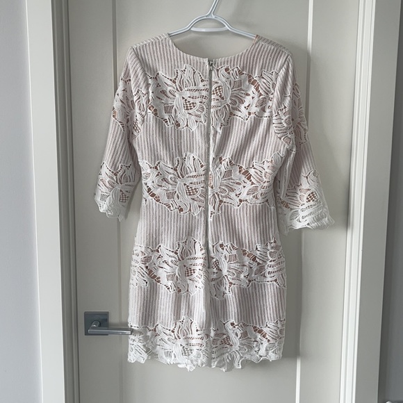 White dress with nude underlay. - Picture 2 of 3